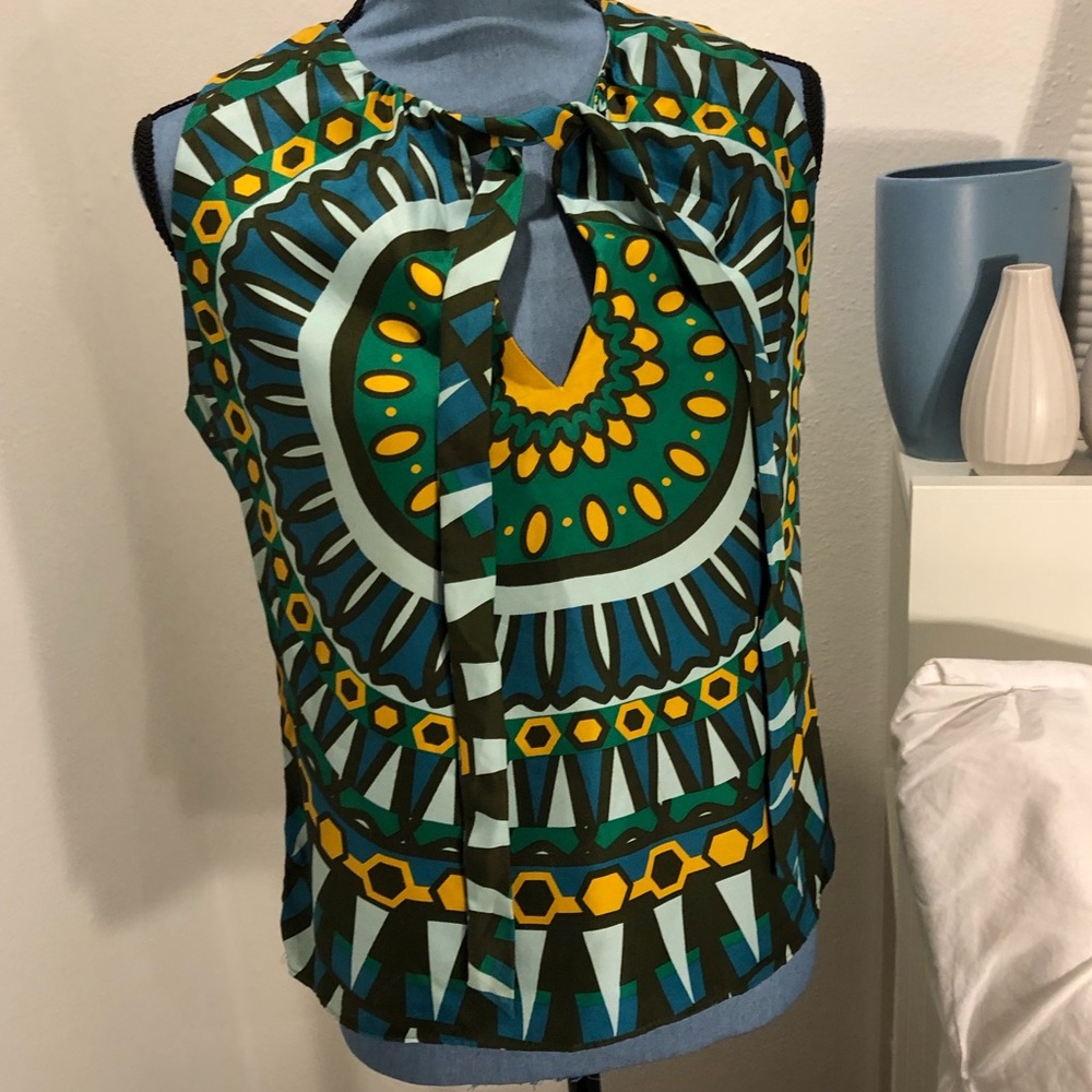 Tori Burch sleeveless silk blouse w/ boho print.